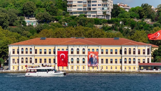 Morning view in a sunny day of Kabatas Erkek Lisesi building, or Kabatas High School, suited by Bosphorus Strait in Ortakoy, Besiktas, Istanbul, Turkey
