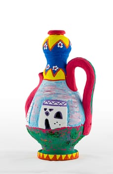 Nubian style handmade artistic painted colorful decorated pottery jug with one handle on white background