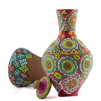 A painted pottery composition of a drinking vessel and a goblet drum on white background
