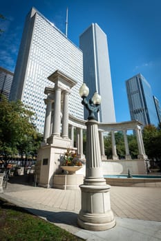 October 09, 2018, Millenium park, Chicago, Illinois, USA : famous entrance of the millenium park in the center of Chicago city with the skyline of downtown