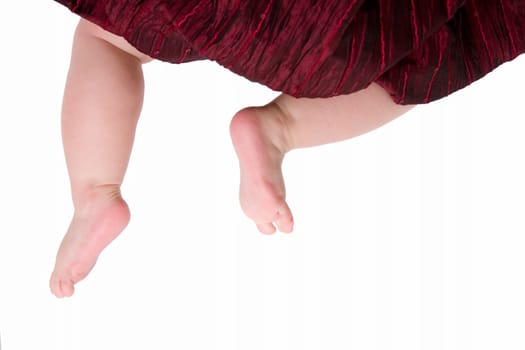 little feet of newborn baby isolated on white background