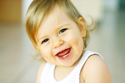 Small baby is laughing