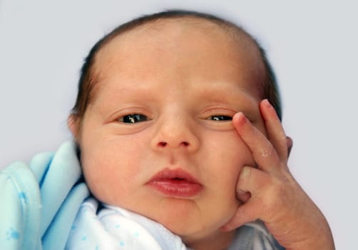 Thinking baby on his first day