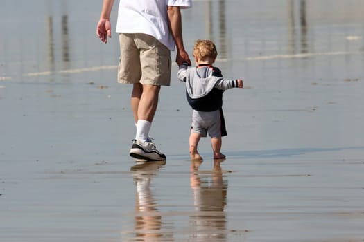 Father and son on the beach