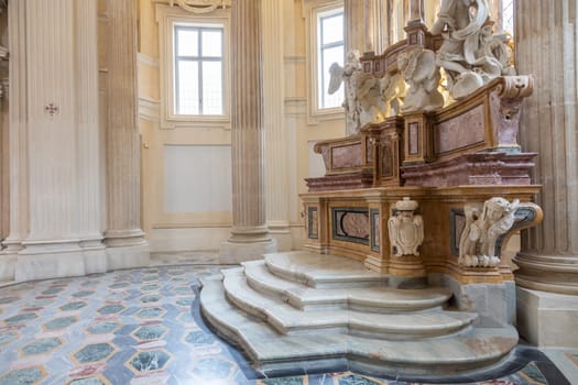 VENARIA REALE, ITALY - Circa January 2022: Baroque catholic church altar. Old interior religious building.