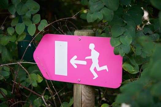 Escape route in case of evacuation in a public park in the city of Mulhouse, France