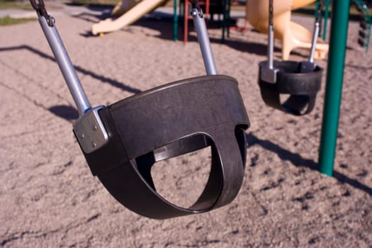 childrens swing in motion without the child