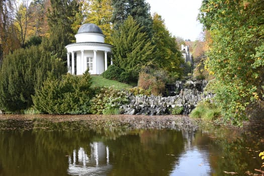 The Jussow Temple built in 1818 in the Bergpark Wilhelmshöhe in the city of Kassel in Hesse with an open colonnade stands at the fountain pond at the end of the Peneu cascades.