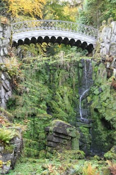 The devils bridge in the Bergpark Wilhelmshöhe in the city of Kassel in Hesse spans the Höllenteich. In 1826 the lattices of the bridge were cast from solid metal. A popular destination