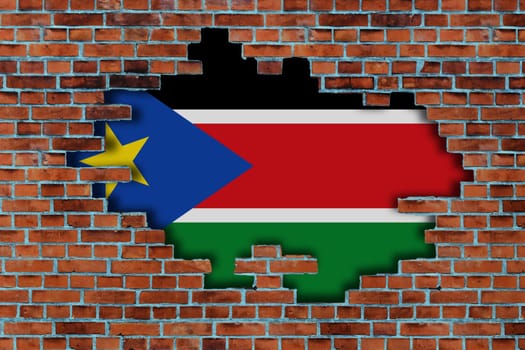 3D Flag of South Sudan behind the broken old stone wall background.