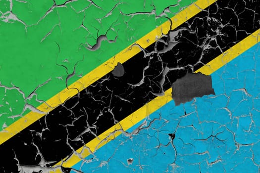 3D Flag of Tanzania on an old stone wall background.