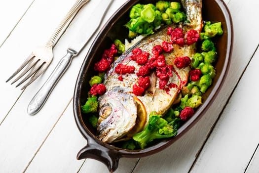 Appetizing grilled fish in fruit marinade. Seafood