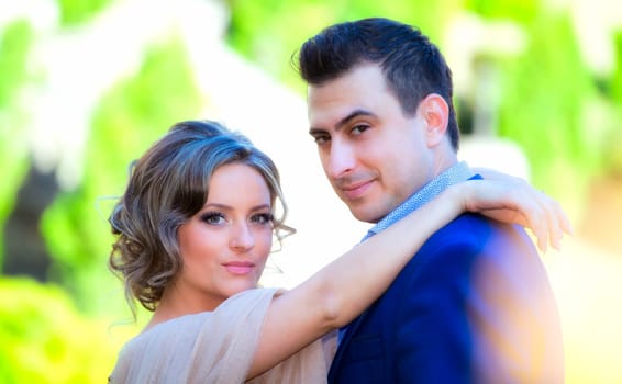 Newly wed couple outdoor on a summer day.
