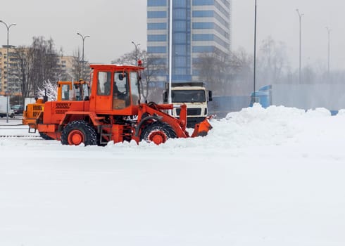 Heavy machinery cleaning the snow after heavy snowfall