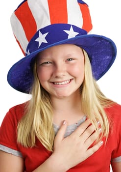 A pretty American girl smiling and saying the Pledge of Allegiance.  White background