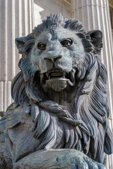 Lion statue entrance to Congress of the Deputies Madrid Spain government building