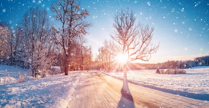 Beautiful view of the sunrise in the morning on the country snowy road. Scenery landscape.