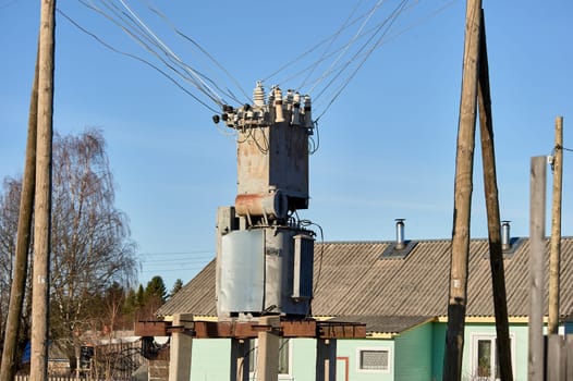 the transformer stands on concrete pillars. High quality photo