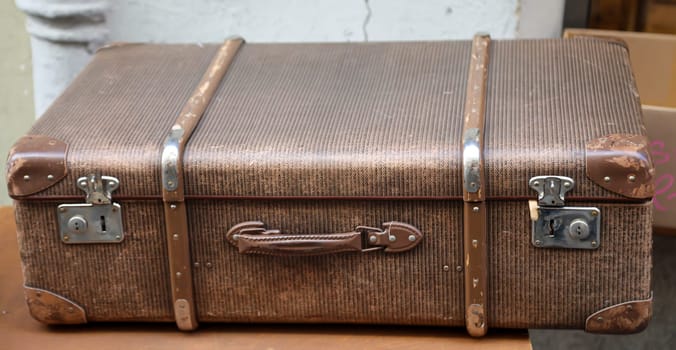 Details of an old suitcase as it was used 50 years ago.