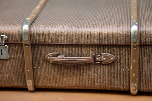 Details of an old suitcase as it was used 50 years ago.
