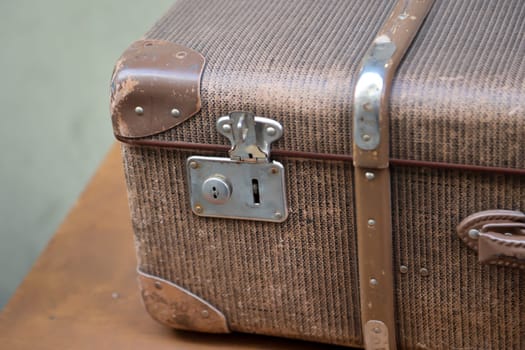 Details of an old suitcase as it was used 50 years ago.