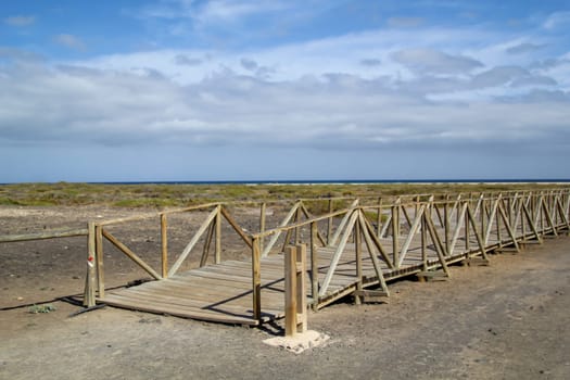 Detail of a railing to delimit an access of a biotope.