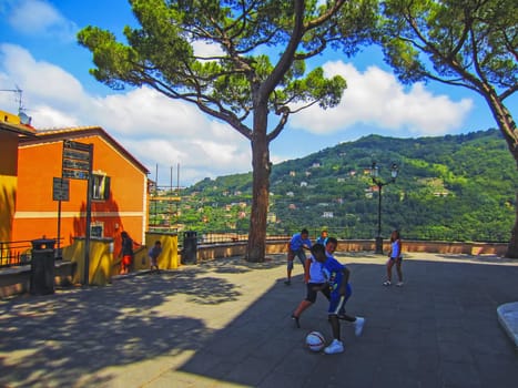 Children playing with ball,Italy