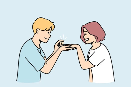 Loving man make proposal to excited woman. Caring happy male put engagement ring on smiling female finger. Marriage and relationship goal. Vector illustration.