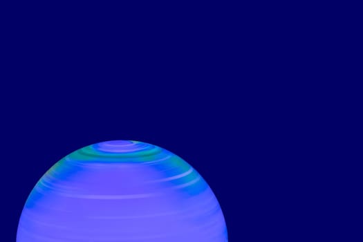 Background Earth shining. A luminous and rotating terrestrial globe or planet earth against dark background with space for design. Beautiful backdrop. Macro.
