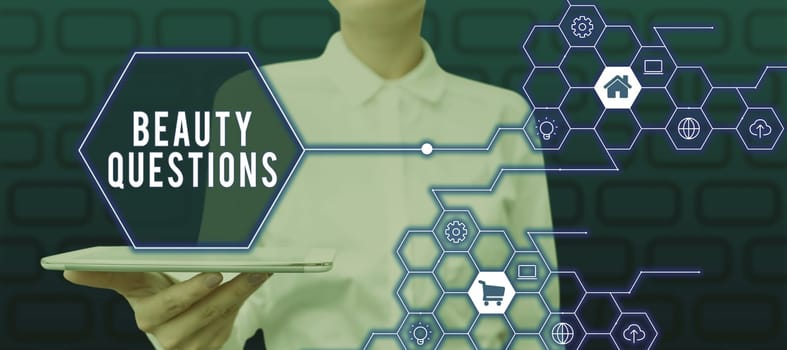 Text sign showing Beauty Questions, Business idea digital marketplace where traders can buy and sell bitcoins Woman Holding Tablet Showing Graphical Hexagon For Business Branding.