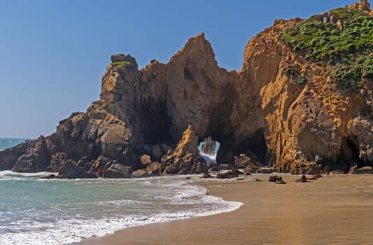 Jagged Sea Stack on a Coastal Beach at Pfeiffer Big Sur State Park in California
