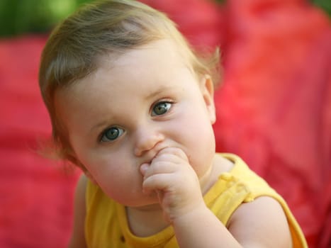 Cute happy one year old baby