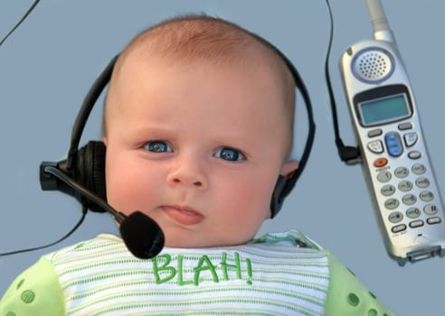 Baby with a headset on a blue background