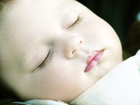 Close-up portrait of a cute sleeping baby