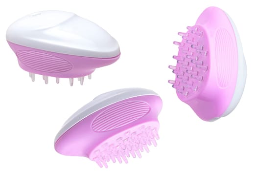Close up of three battery operated scalp massage brushes, shampoo brushes or scalp massager for exfoliating and massaging the scalp. Beauty and health concept.