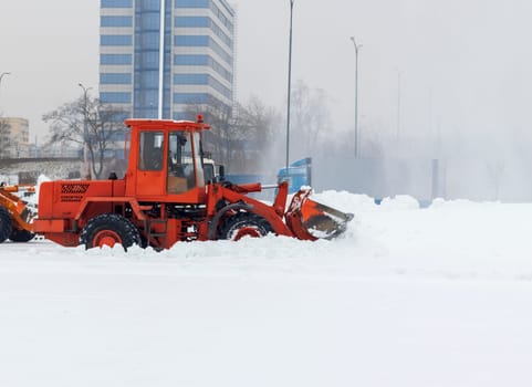Heavy machinery cleaning the snow after heavy snowfall