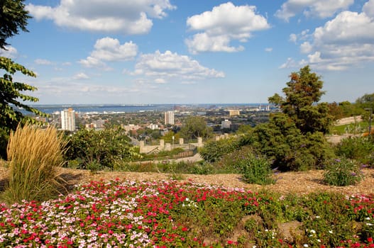 A beautiful landscape with a big city on the lake Ontario with blue sky and.white clouds..