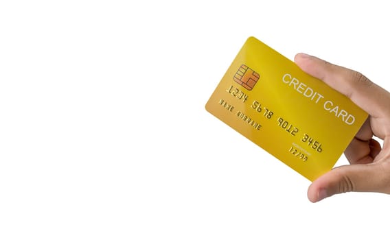 Hand holding credit card isolated on white background. Shopping concept. Cashless spending concept.