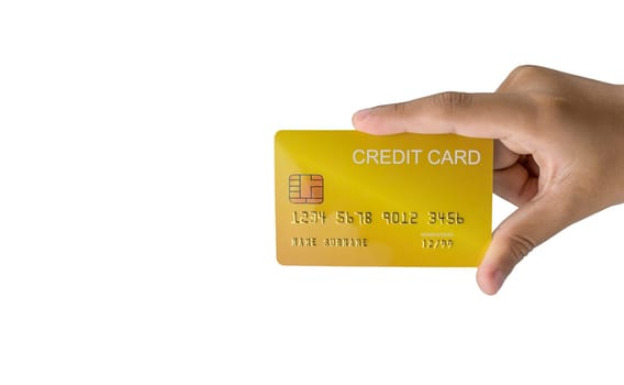 Hand holding credit card isolated on white background. Shopping concept. Cashless spending concept.