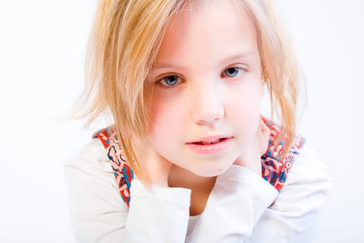 Studio portrait of a blond child