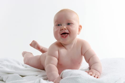 toddler on towel after refreshing bath