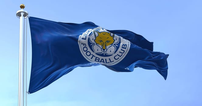 Leicester, UK, Oct. 2022: The flag of Leicester City Football Club waving in the wind. Leicester City FC is an English football club based in the city of Leicester. 3D illustration render