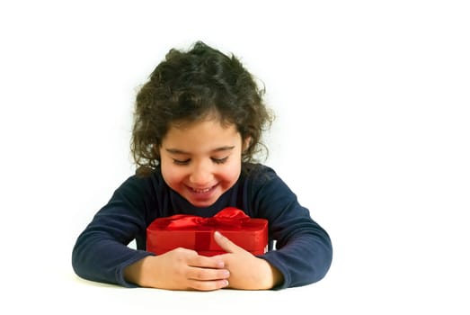 little girl holding present isolated on white