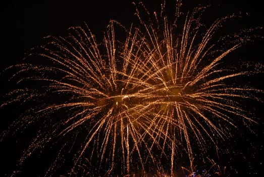 several bursts of fireworks taken at firefall celebration