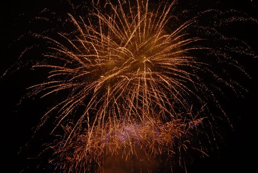 several bursts of fireworks taken at firefall celebration