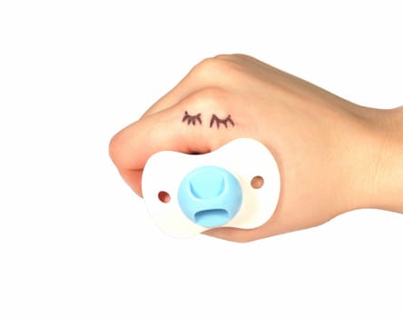hand puppet dressed up as a sleeping baby boy over white