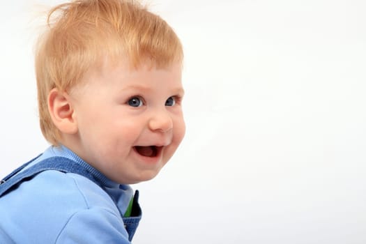 Portrait of the beautiful little boy with emotions