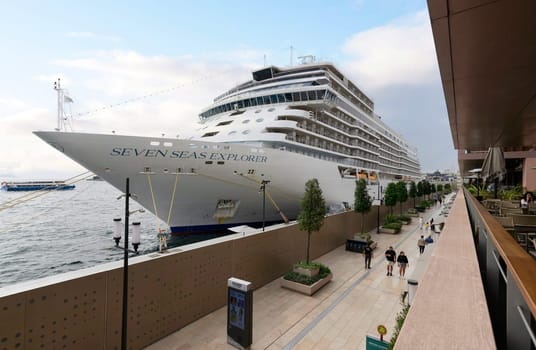 Istanbul, Turkey - August 31, 2022: Seven Seas Explorer, Large cruise ship docked at terminal of Galataport, a mixed use development located along shore of Bosphorus strait, in Karakoy neighbourhood