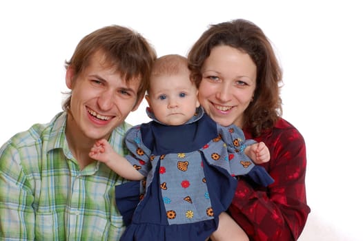 happy family smiling and holding their  baby