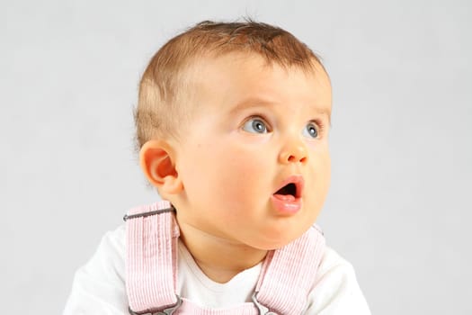 small baby is very curious what is going on